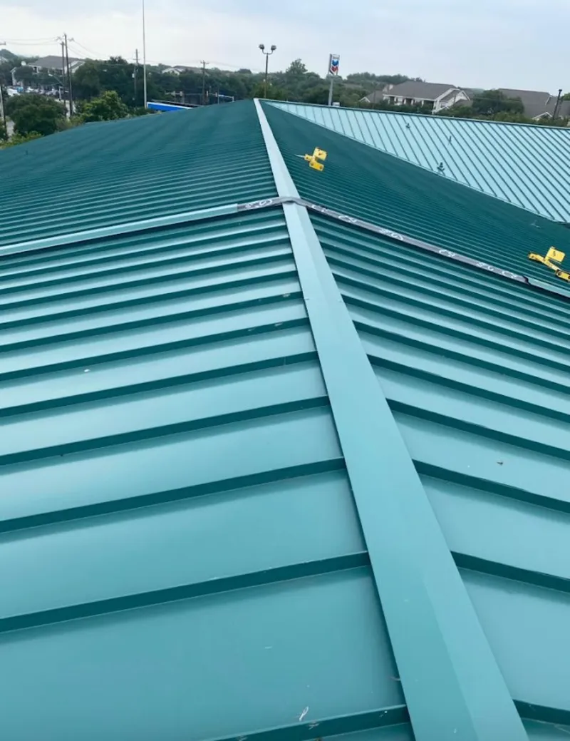 Green commercial metal roof ridge and valley for Metal Roof Repair in Bolton